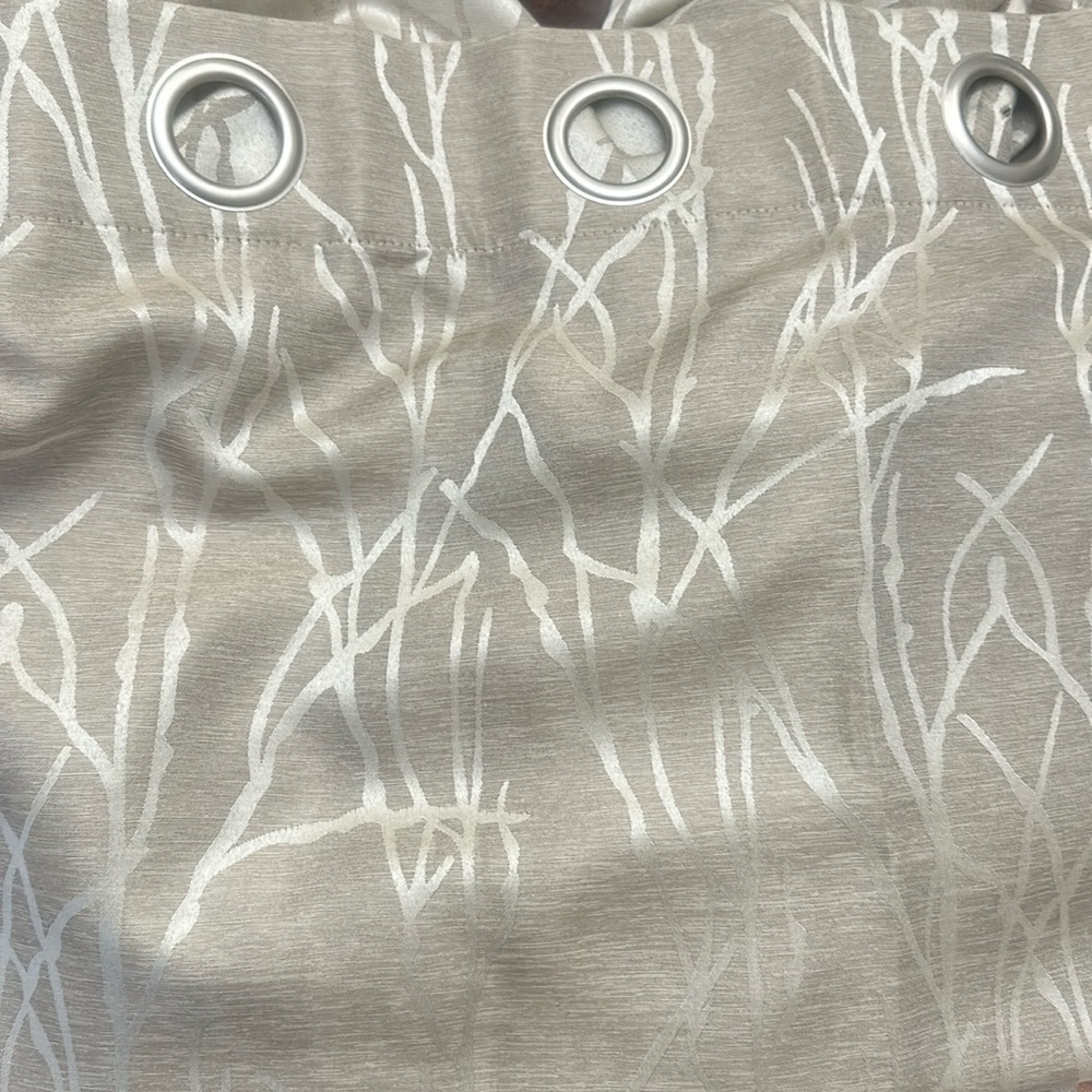 Light beige grommet curtain panels (4)